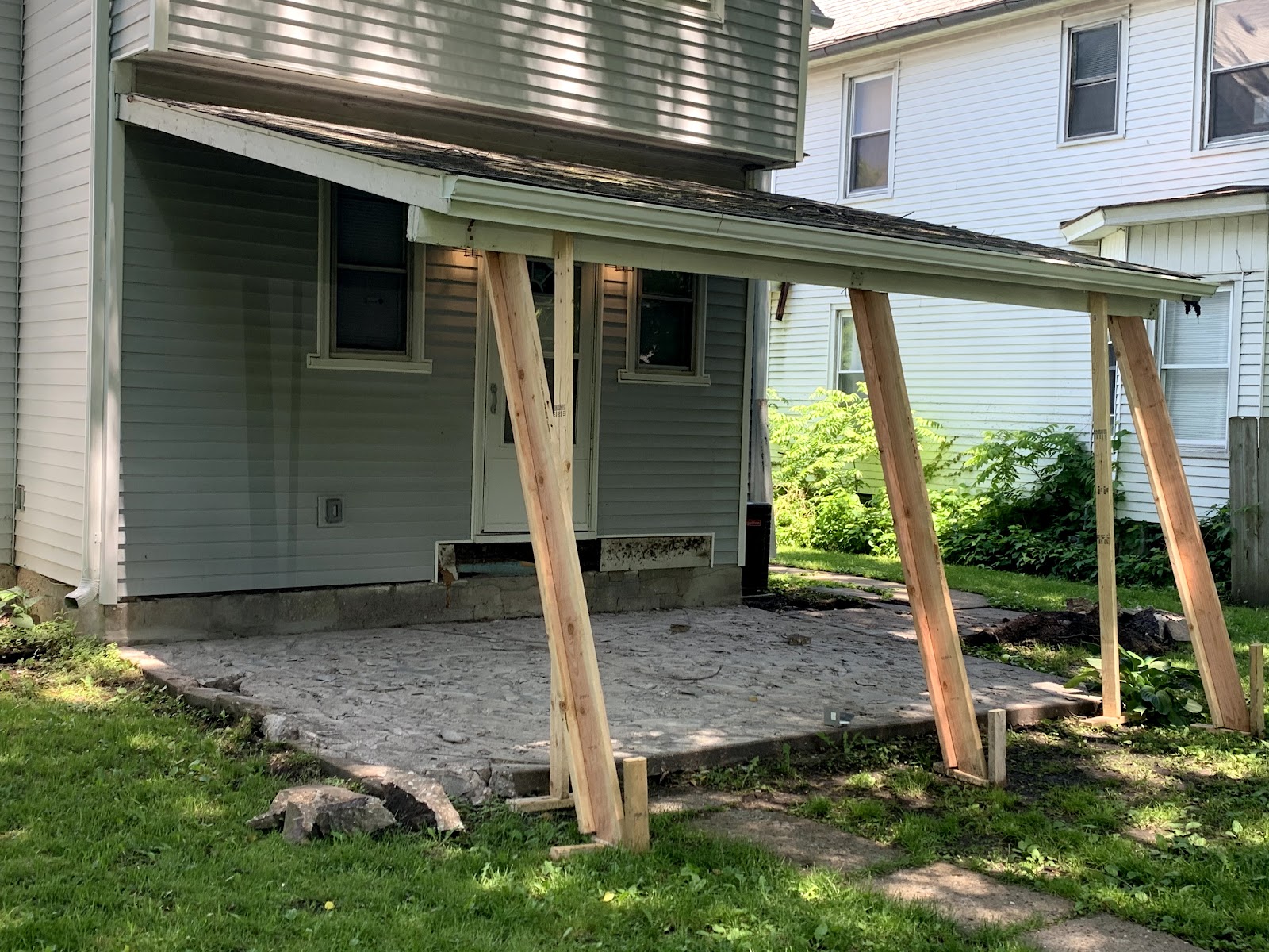 Exterior temporary shoring during foundation stabilization near Eldridge, Iowa