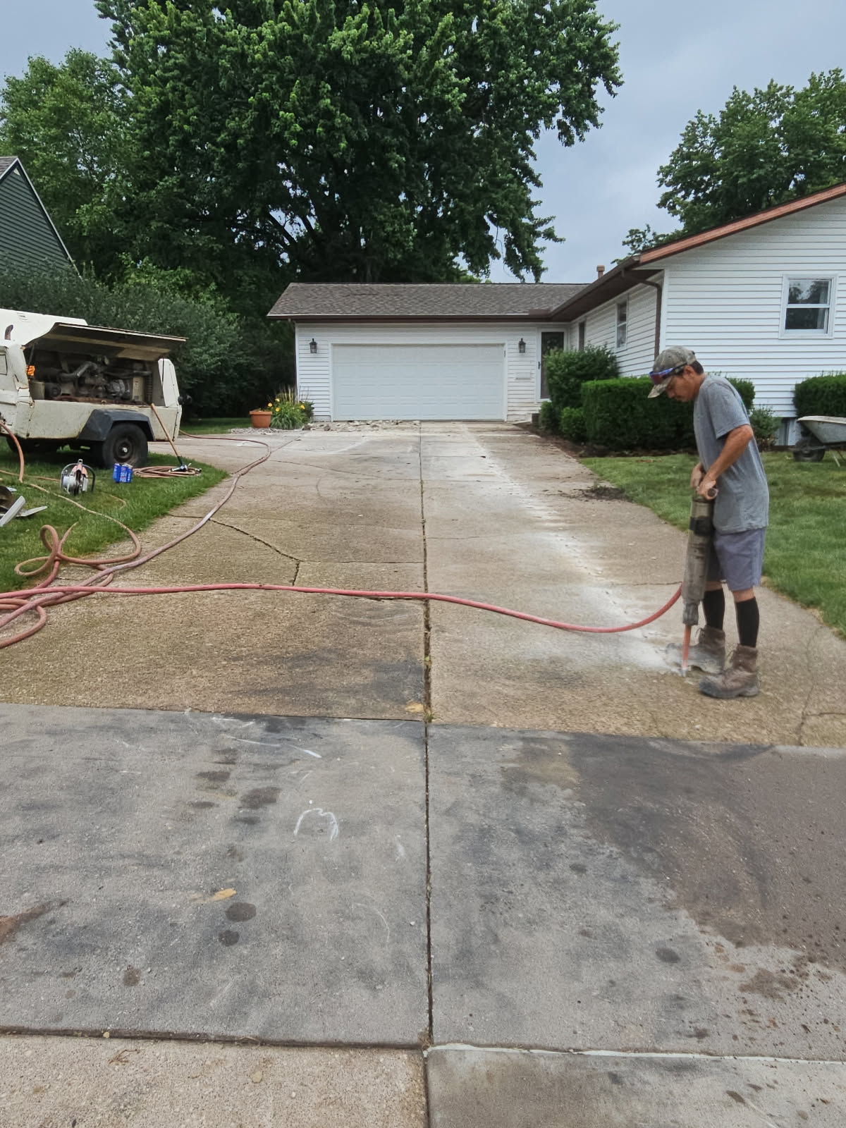 Concrete driveway replacement in Davenport, Iowa by Behncke Construction 1