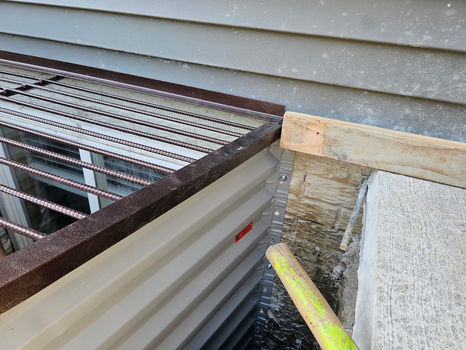 Leaking egress window corrected in the Quad Cities by Behncke Construction 3