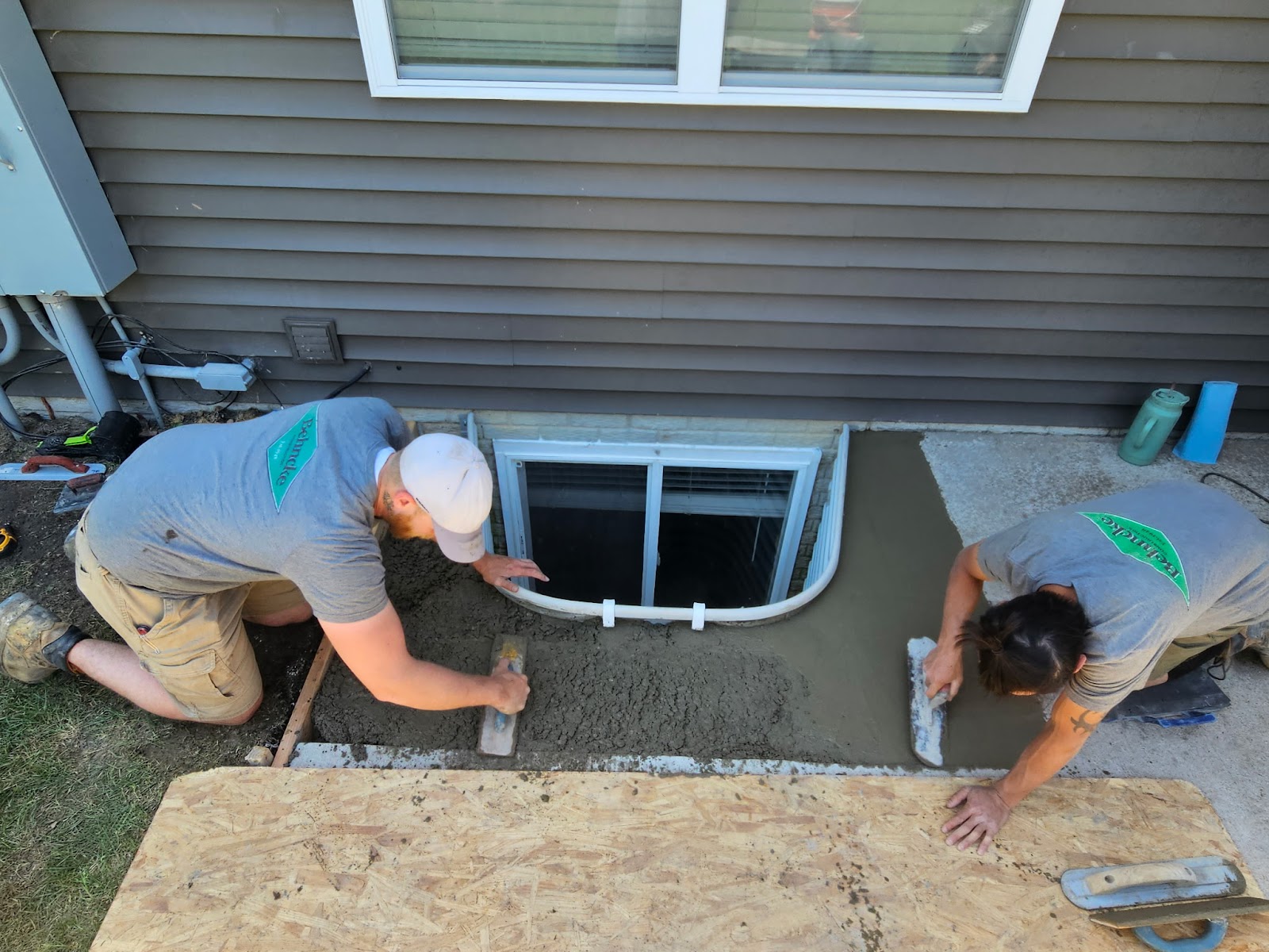 Leaking egress window corrected in the Quad Cities by Behncke Construction 7