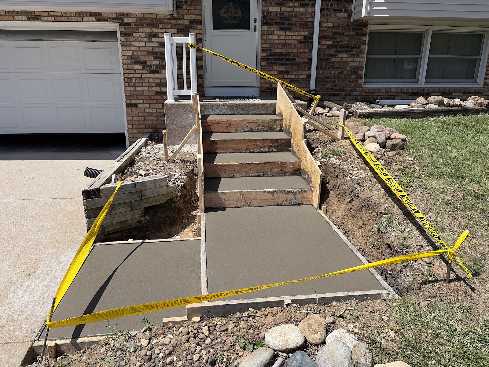 Front stoop and concrete step replacement in Davenport, Iowa by Behncke Construction 1