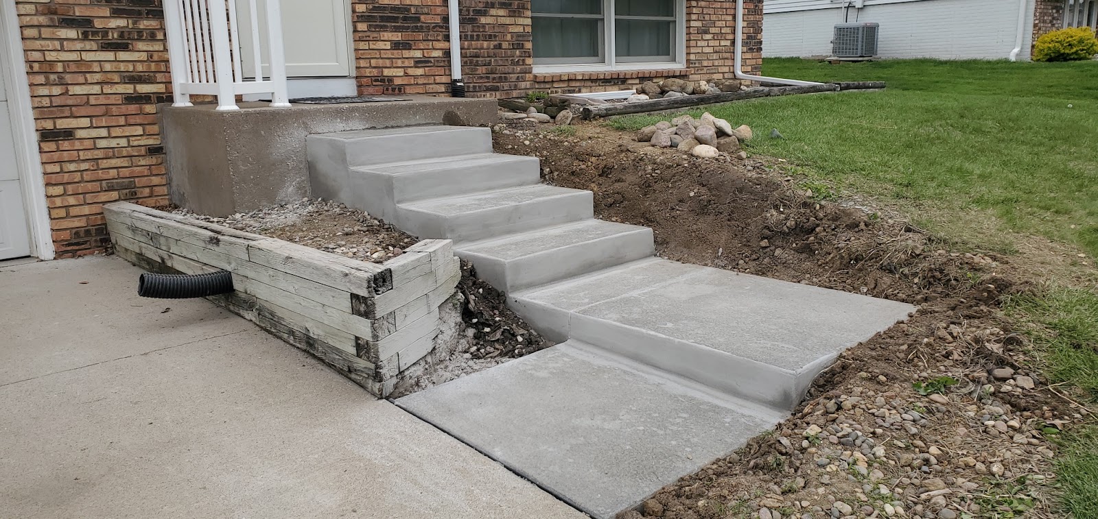Front stoop and concrete step replacement in Davenport, Iowa by Behncke Construction 5