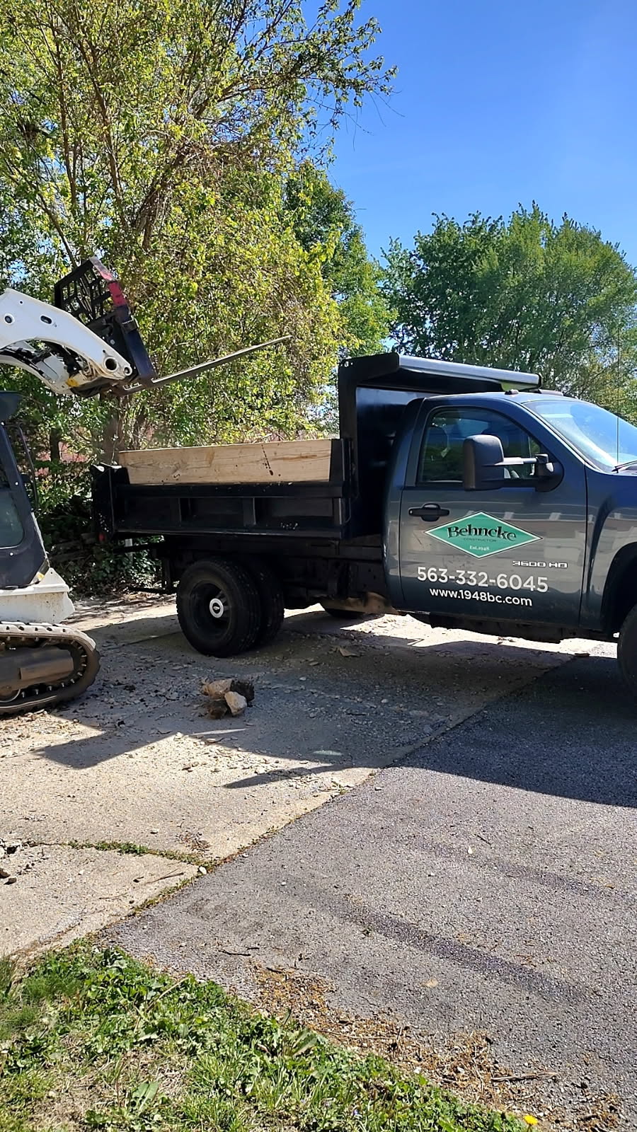 Concrete driveway and retaining wall repair in Davenport, Iowa by Behncke Construction 2