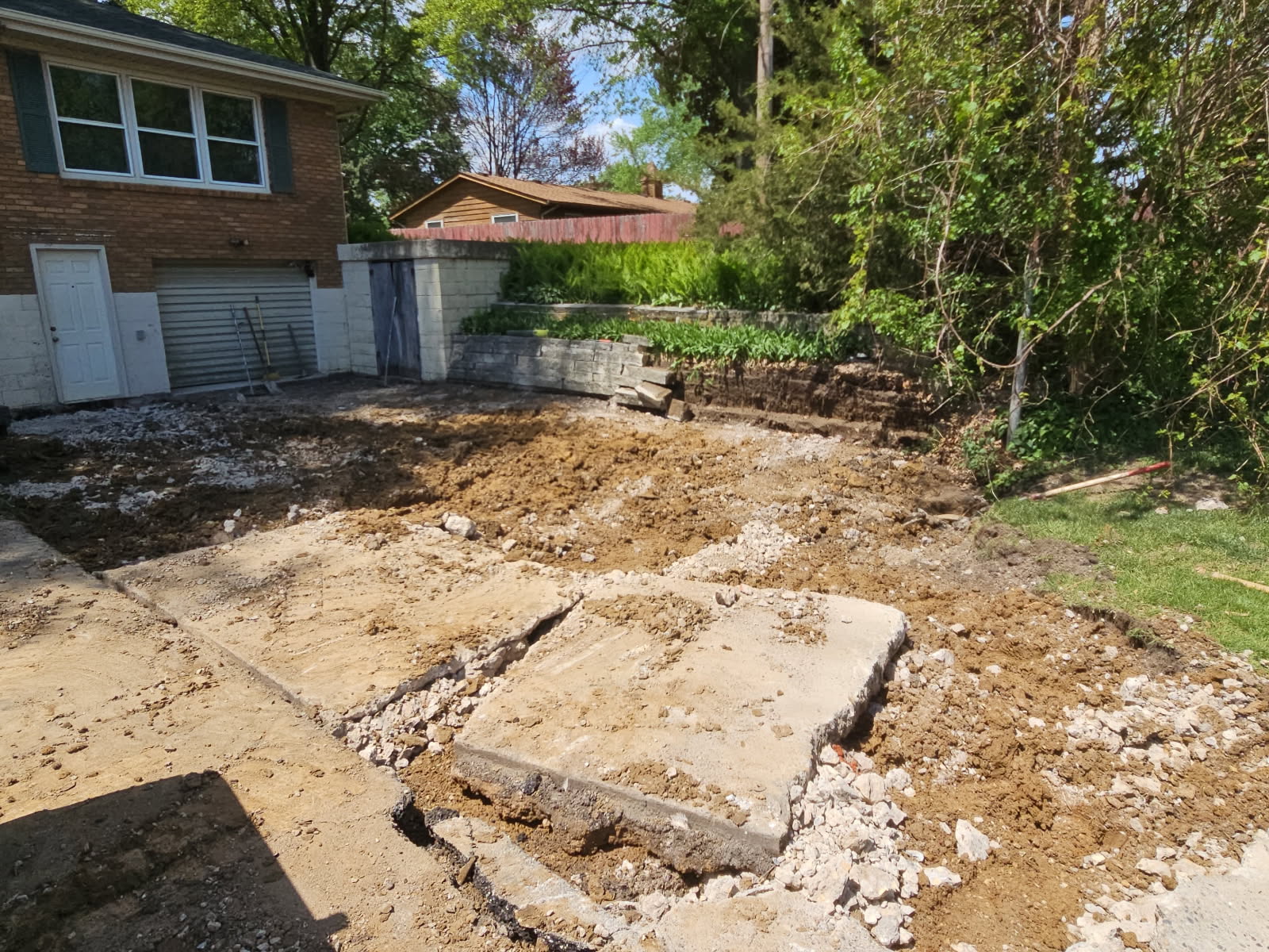 Concrete driveway and retaining wall repair in Davenport, Iowa by Behncke Construction 3