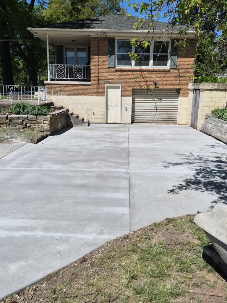 Concrete Driveway and Retaining Wall Repair — Davenport, Iowa