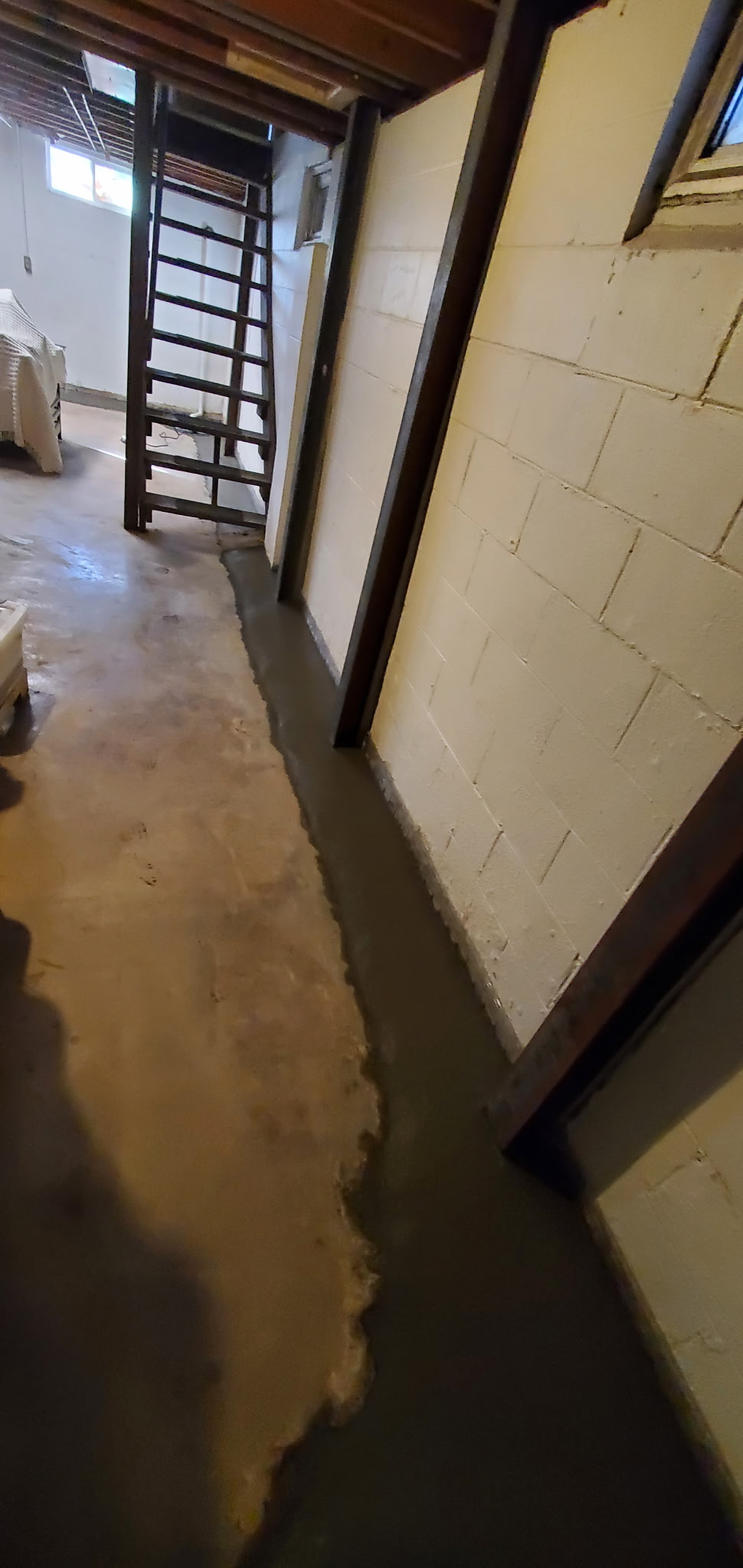 Interior foundation drainage installed to stop the water that drives settlement