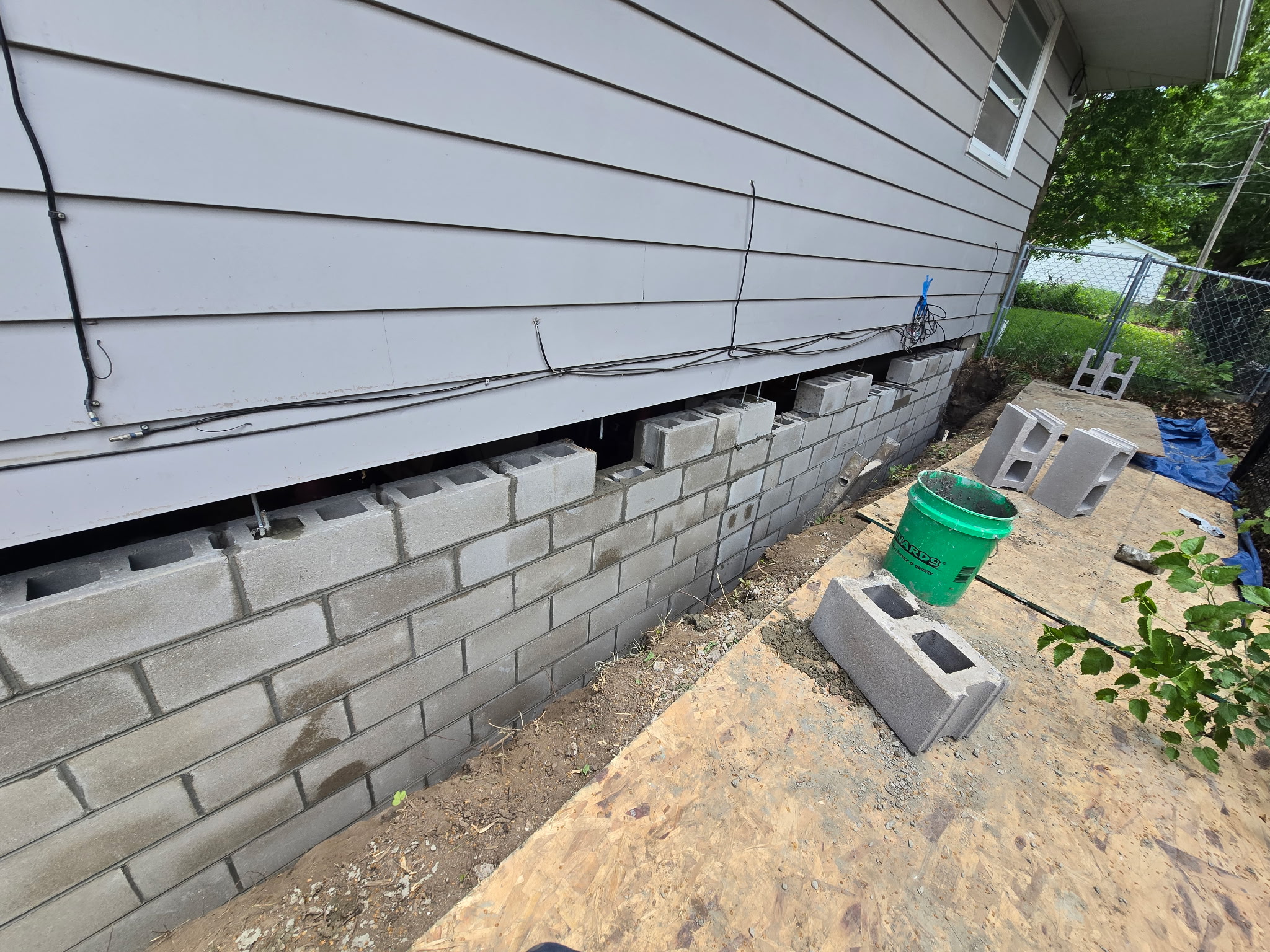 Behncke Construction rebuilding a settled foundation corner in the Quad Cities