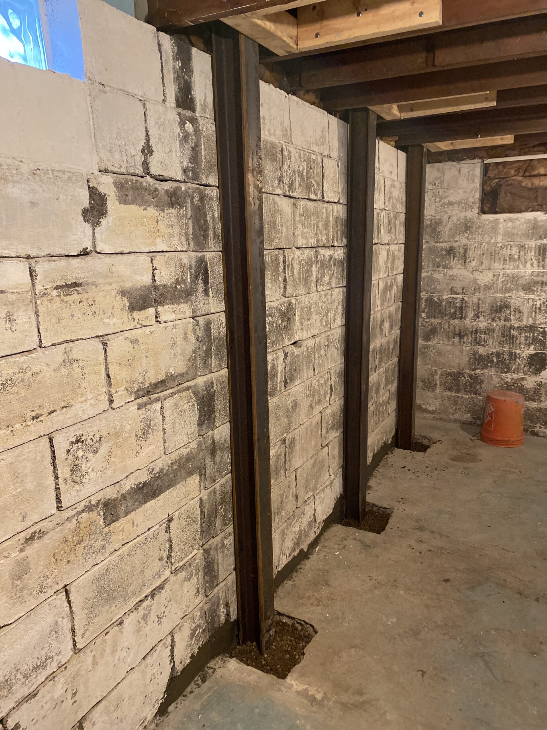 Older basement foundation reinforced with steel beams in the Quad Cities