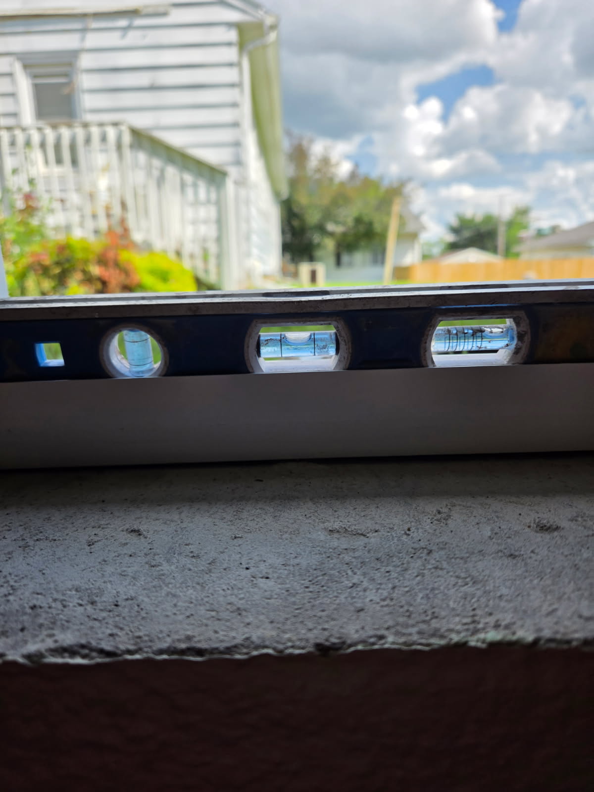 New basement slider window letting natural light into the basement