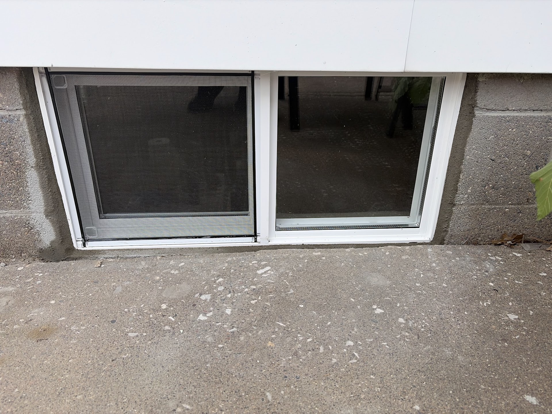 Finished slider basement window seen from inside