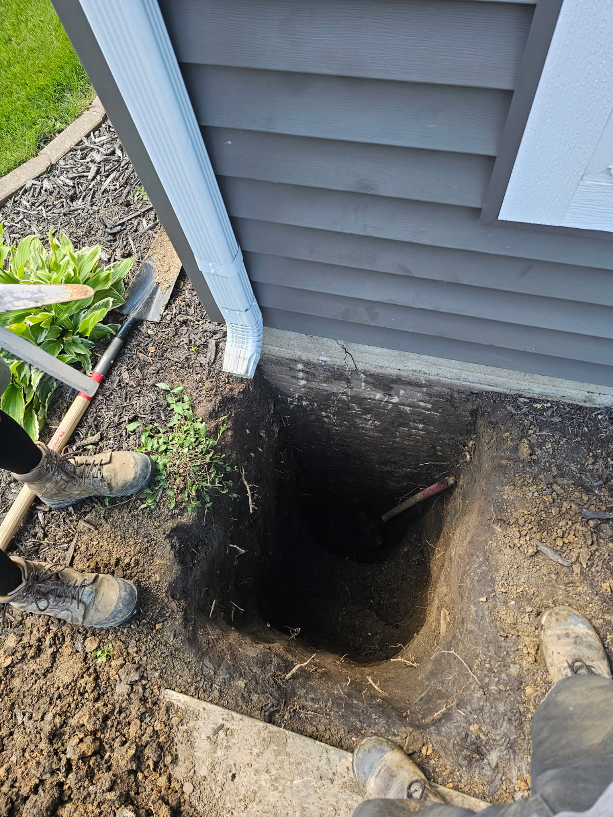 Exterior excavation and foundation crack repair by Behncke Construction in the Quad Cities