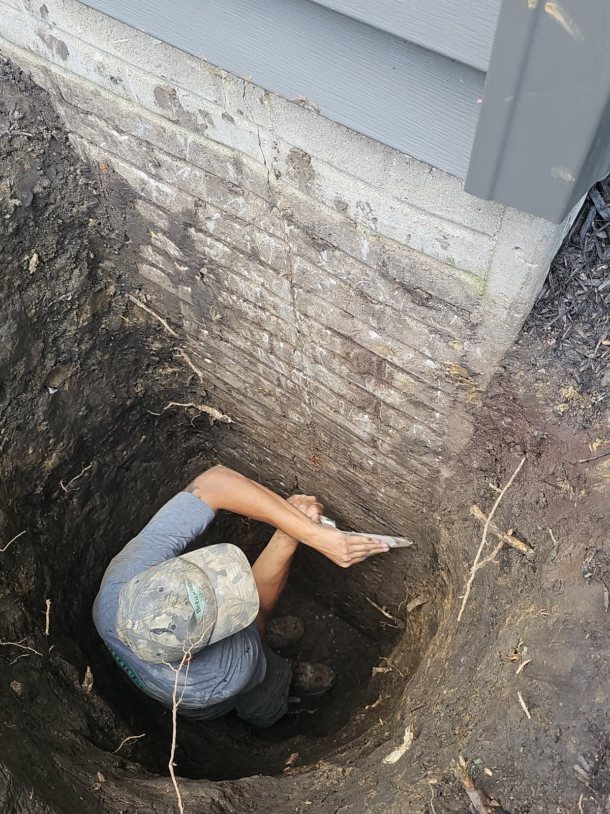 Exterior excavation and foundation crack repair by Behncke Construction in the Quad Cities