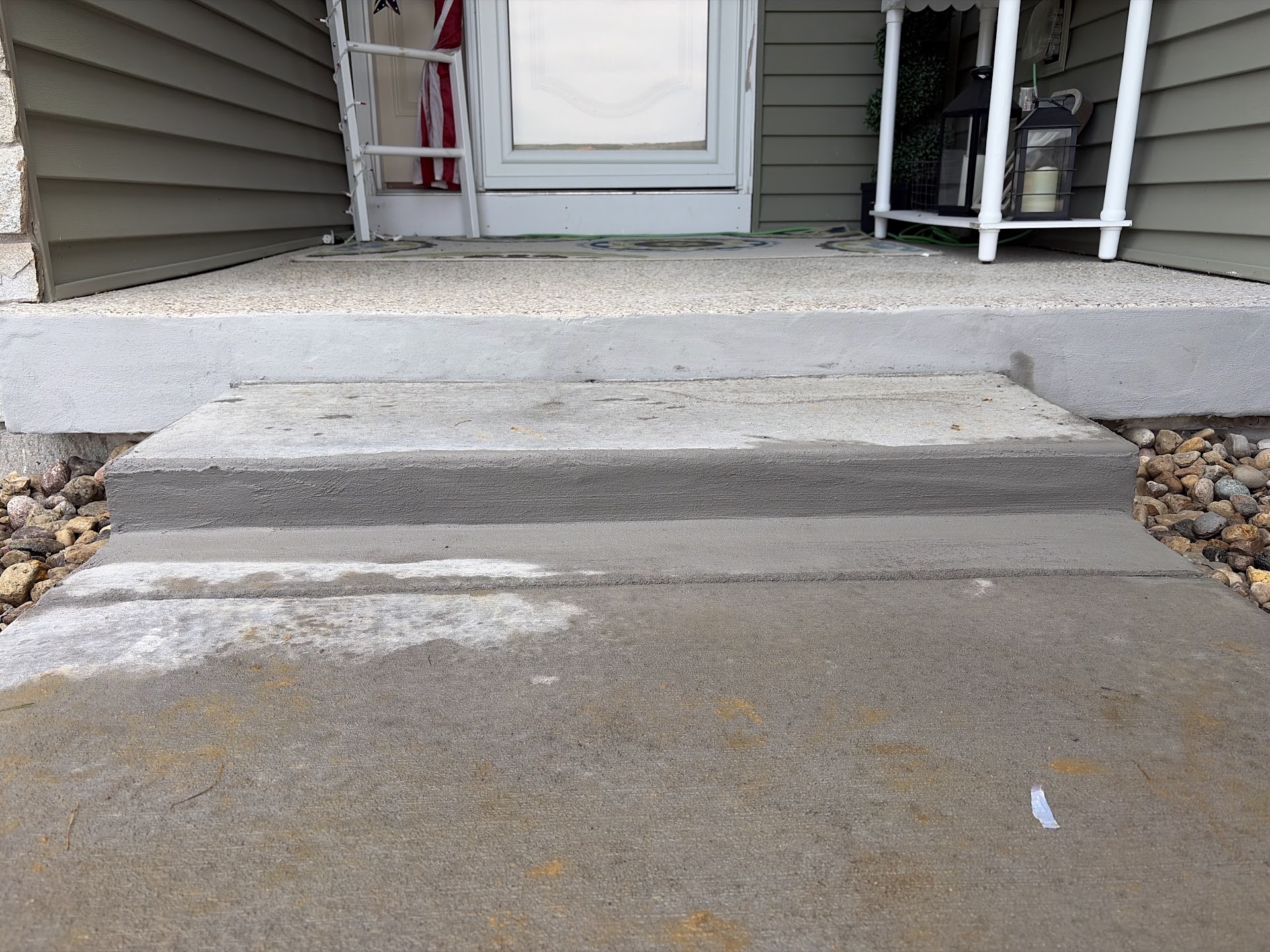 Replaced concrete sidewalk section
