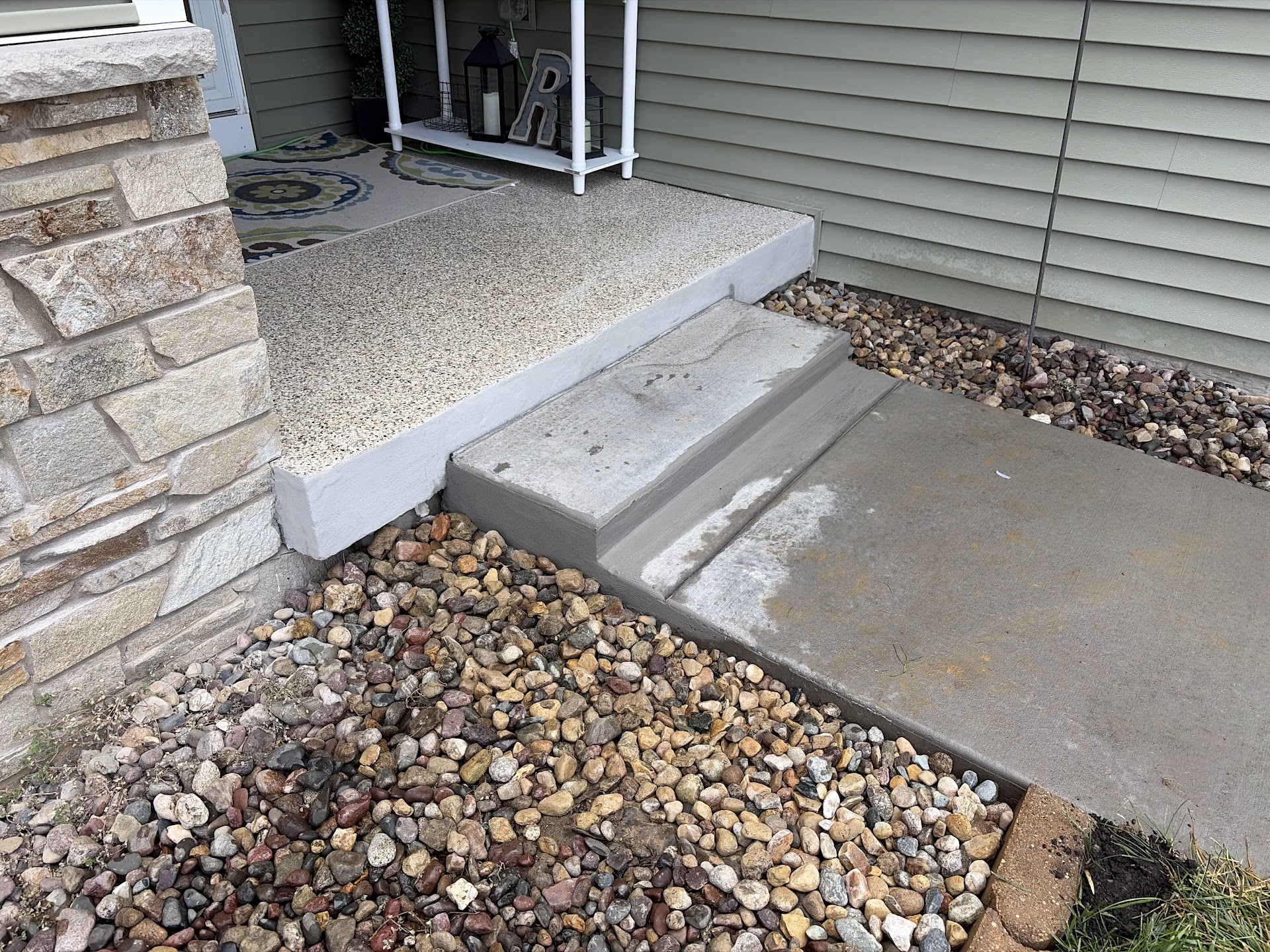 Concrete steps and entryway during the repair