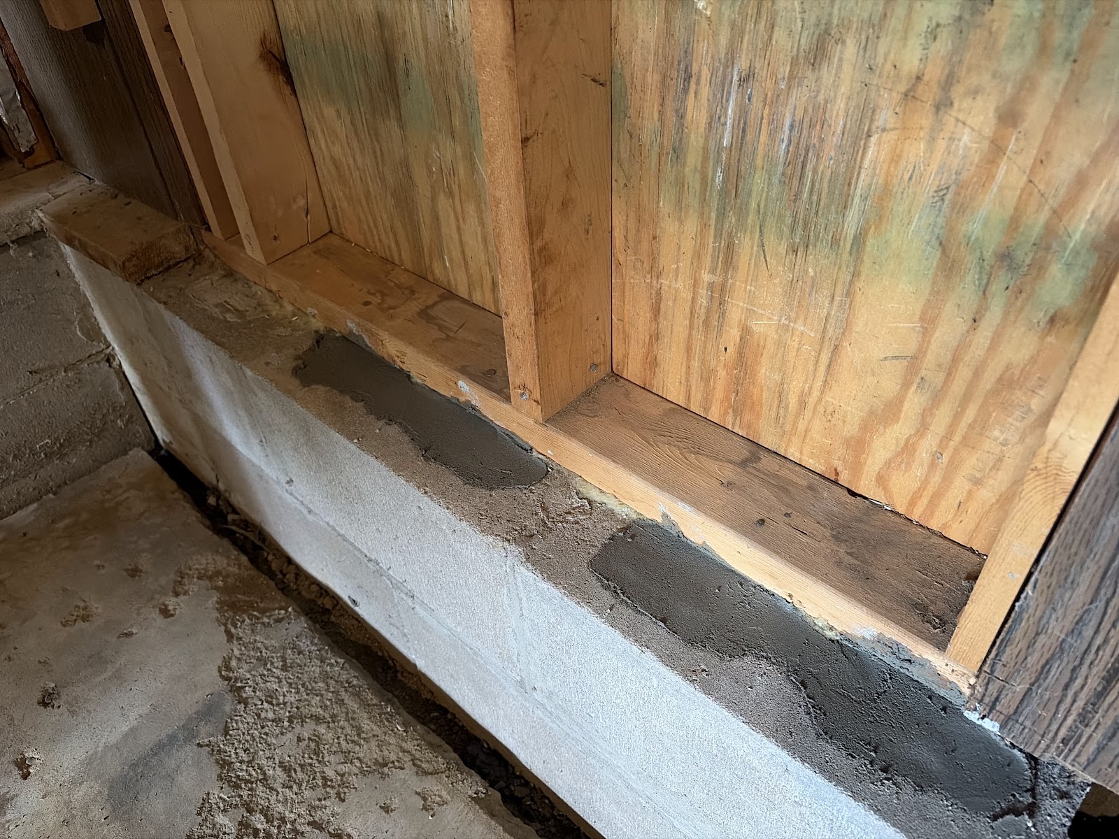 Rear garage wall corner after mortar joint repair and reinforcement