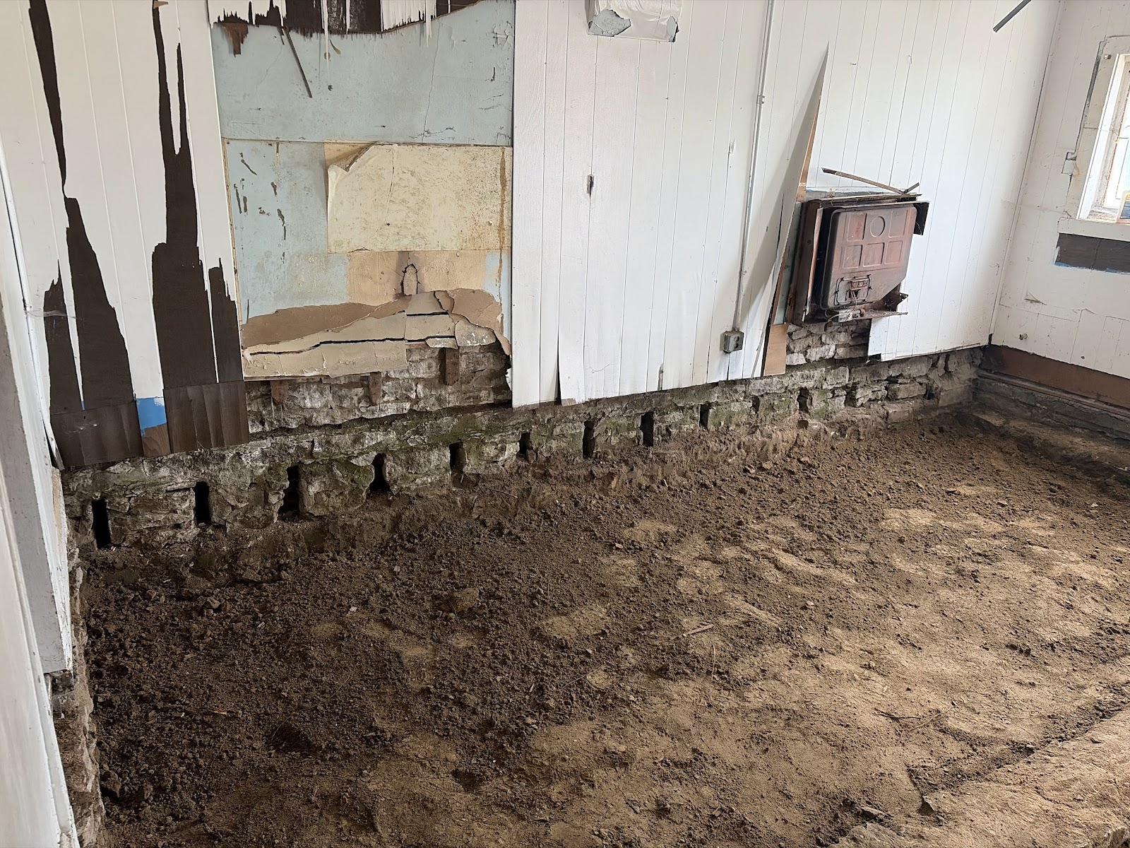 Interior of the Davenport home during the structural floor system rebuild