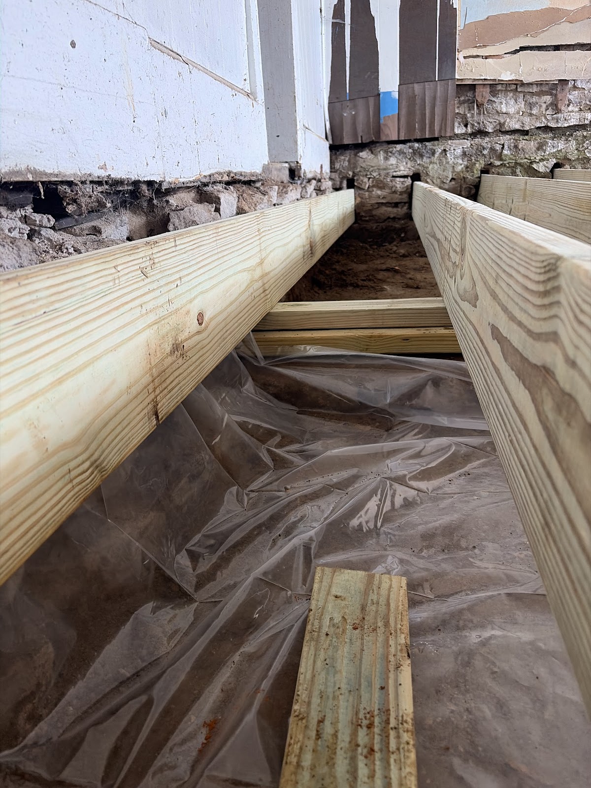 New rim joist and bearing support detail after the floor rebuild