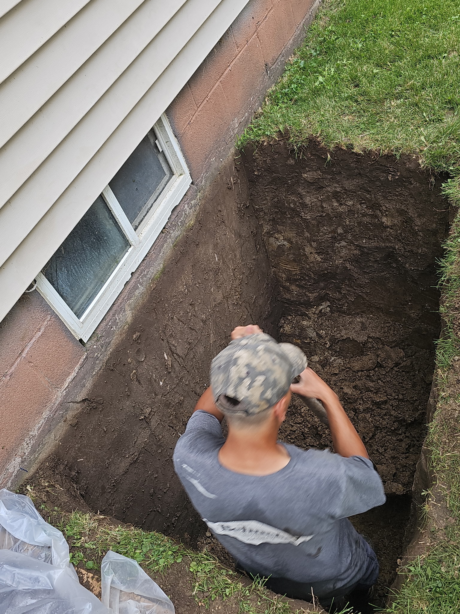 Foundation wall rebuild in Davenport, Iowa by Behncke Construction — photo 11