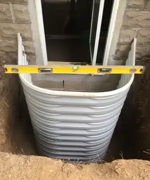 Egress window / basement window well photo