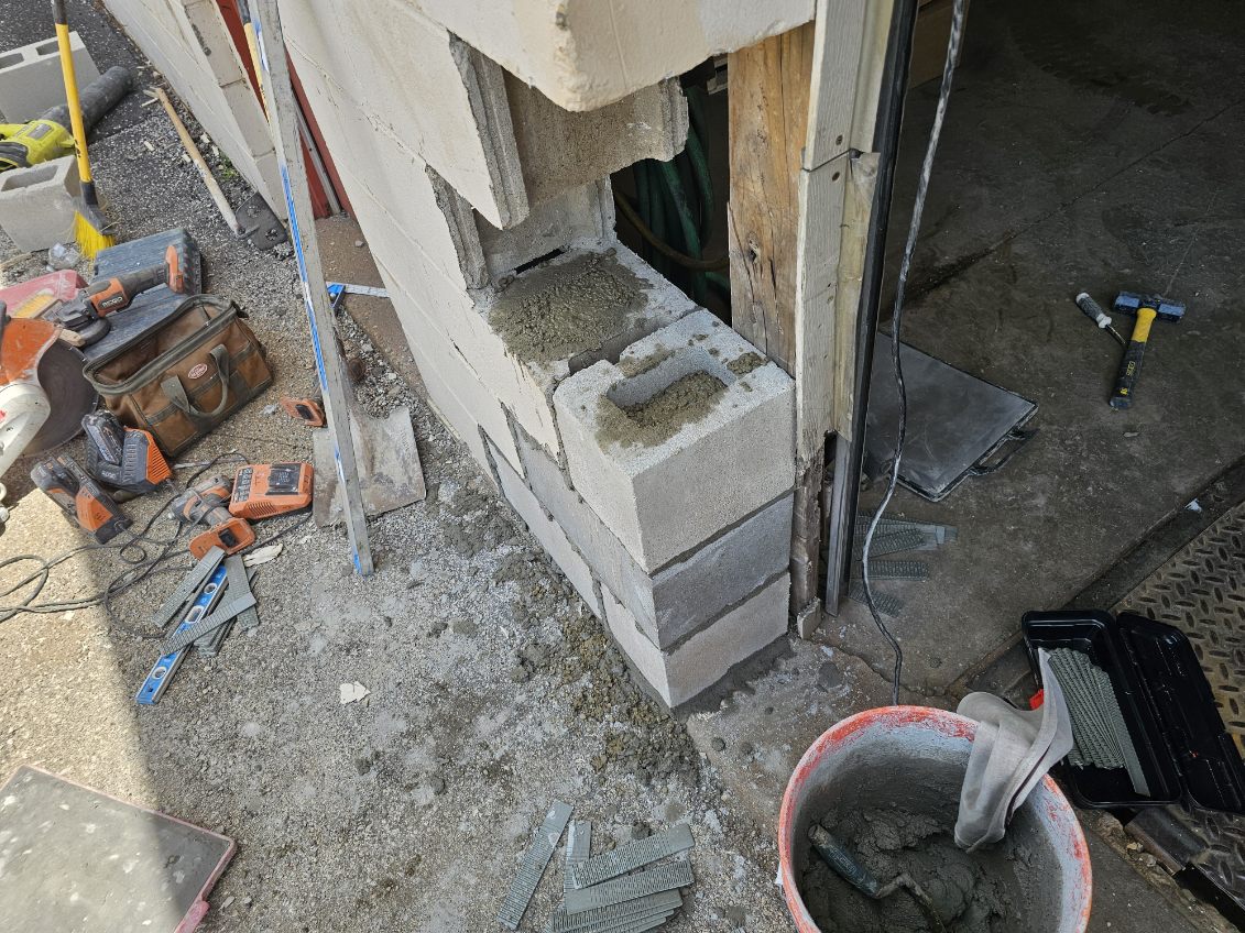 Structural block wall repair in progress — project photo 2