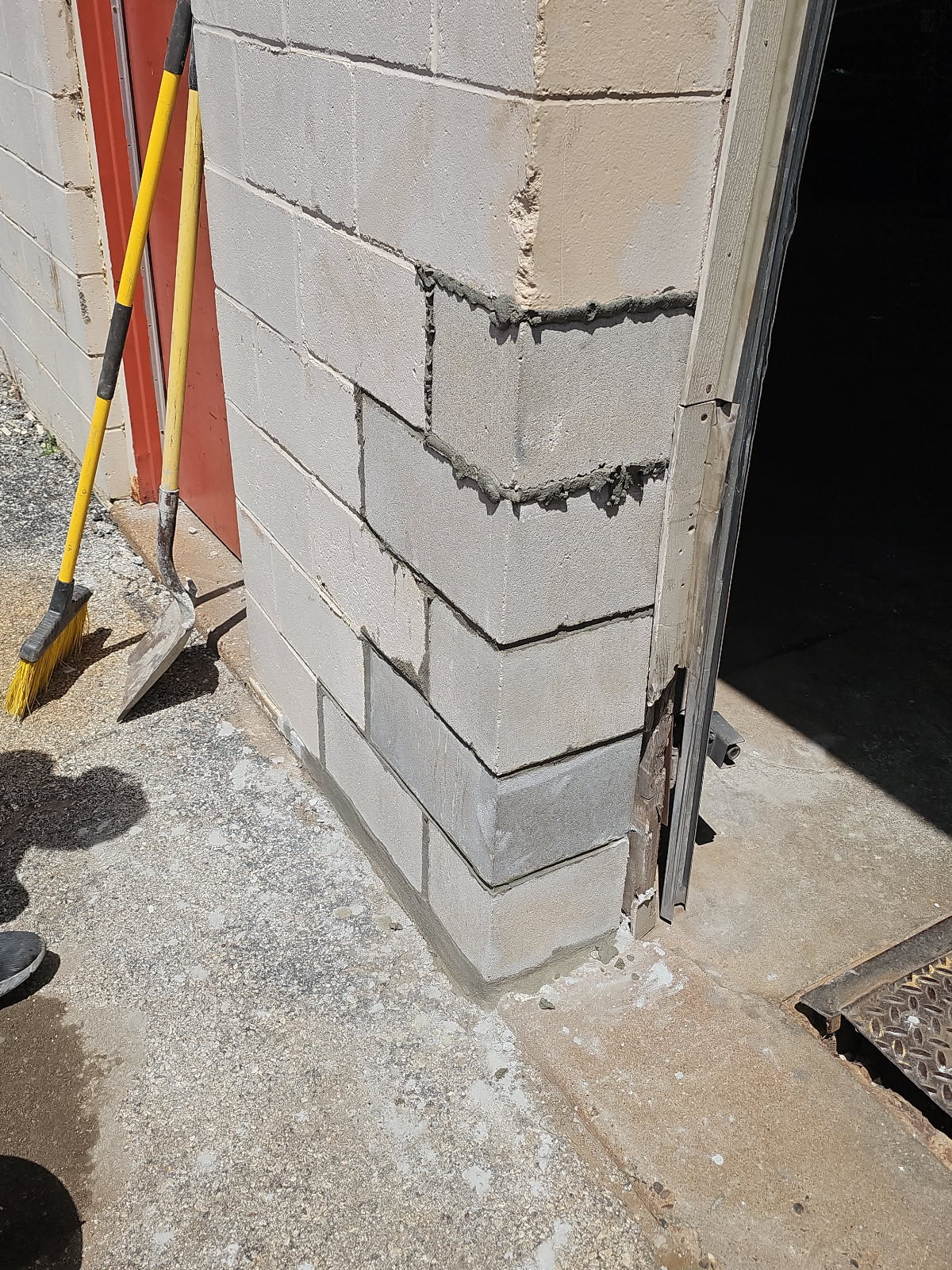 Damaged CMU block wall during replacement — project photo 3