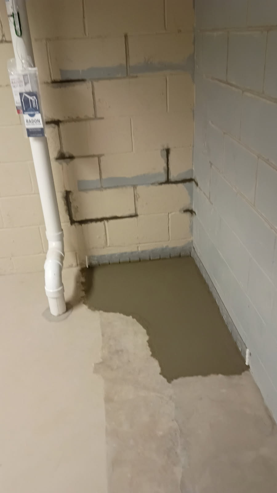 Basement corner along the foundation wall where water had been showing up