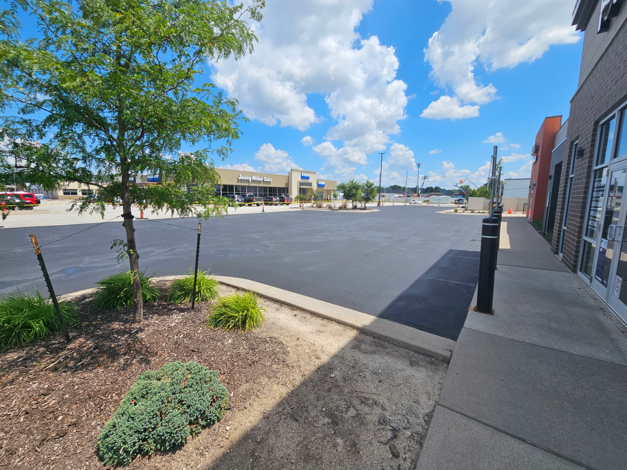 Commercial parking lot off Jersey Ridge Road in Davenport during the phased sealcoating project