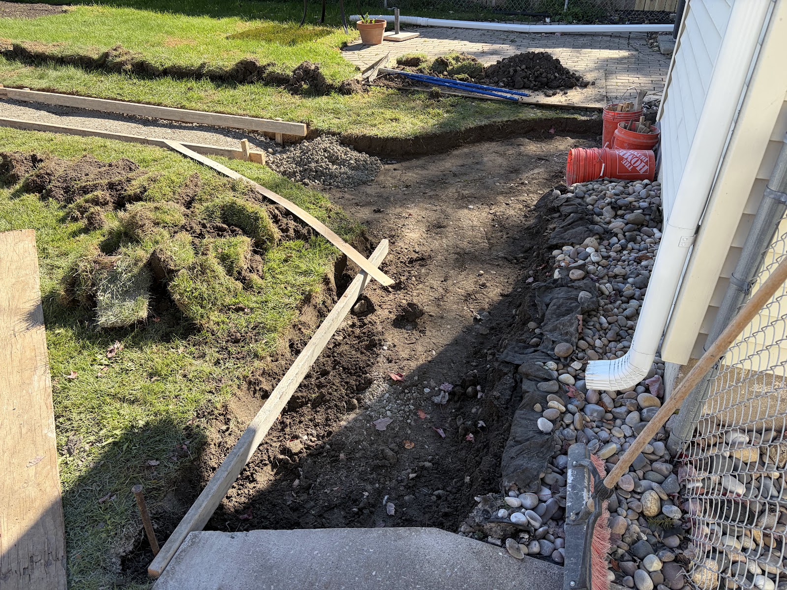 Old sidewalk removed and new walk formed along a Moline house