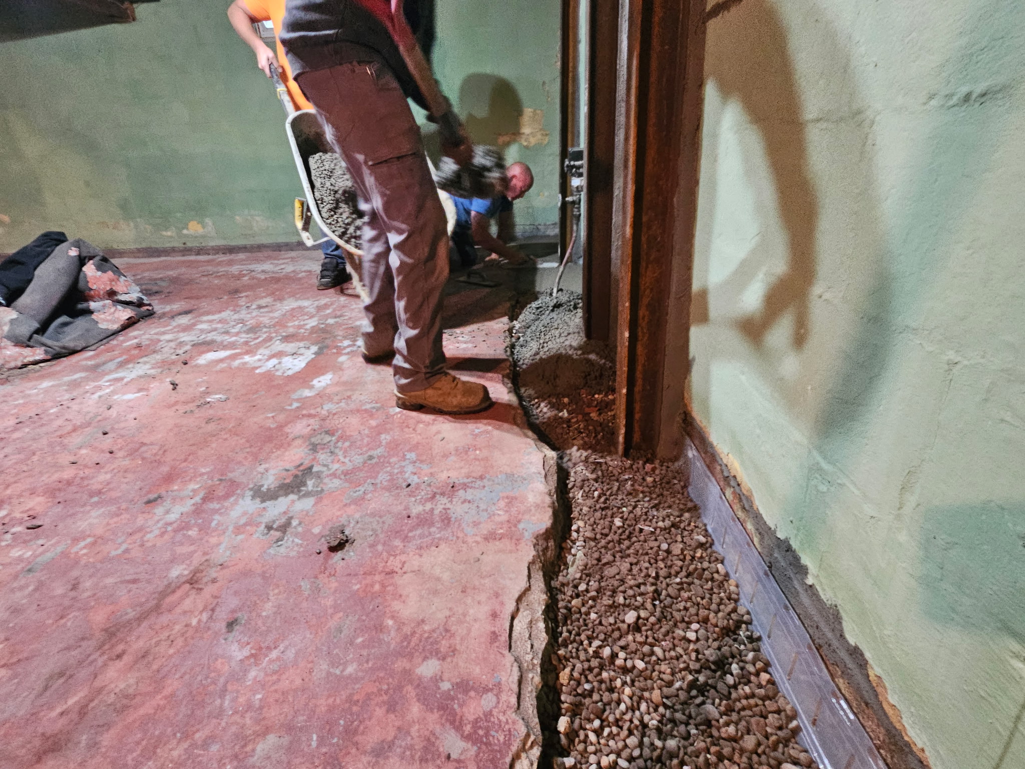 Bettendorf basement during the waterproofing and foundation wall stabilization project