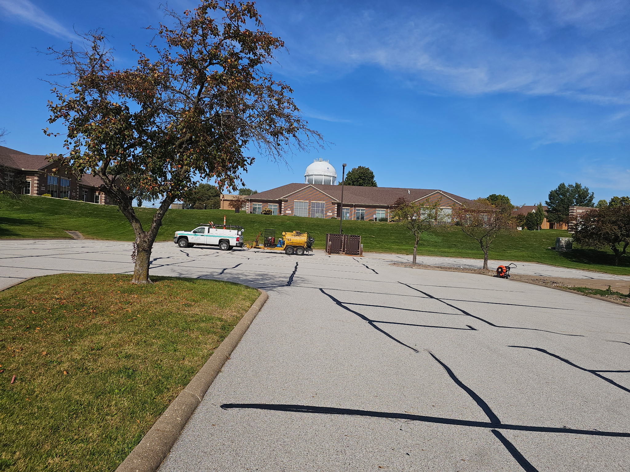 Parking lot at Keller Williams in Bettendorf during the crack filling and sealcoating project