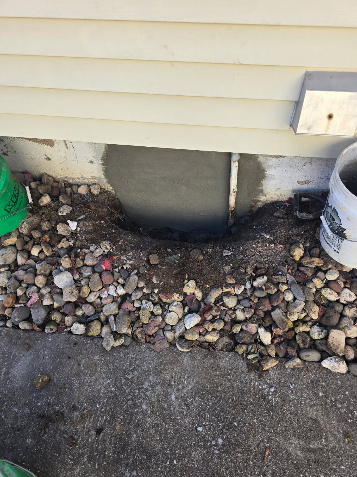 Fresh parging on a section of foundation wall in Moline