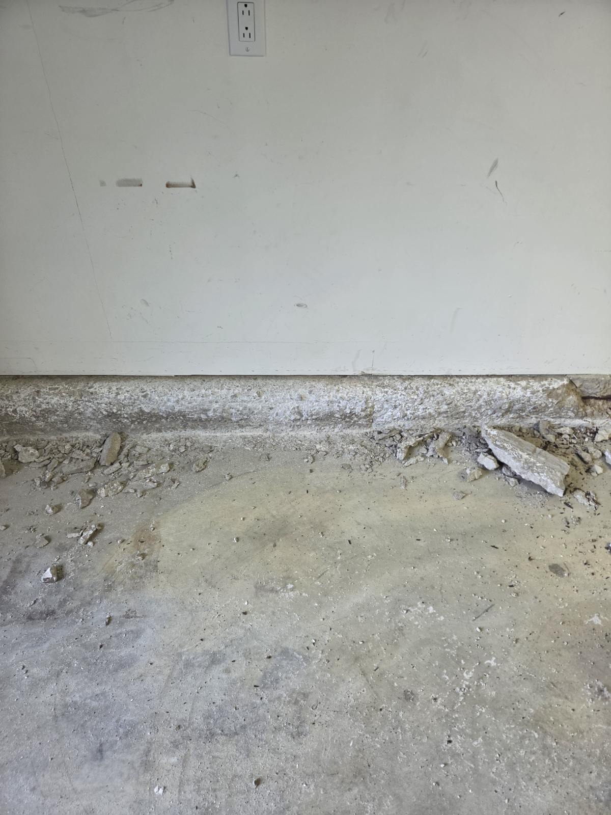 Prepared stem wall with deteriorated concrete removed down to sound material