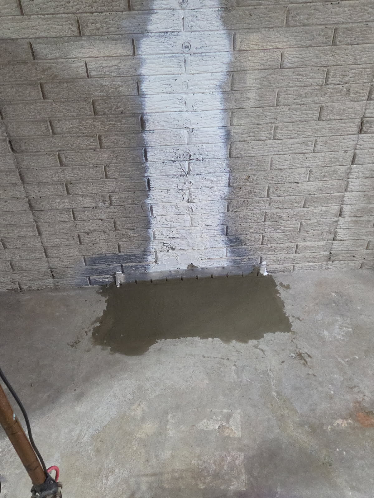 Interior foundation wall with the crack sealed