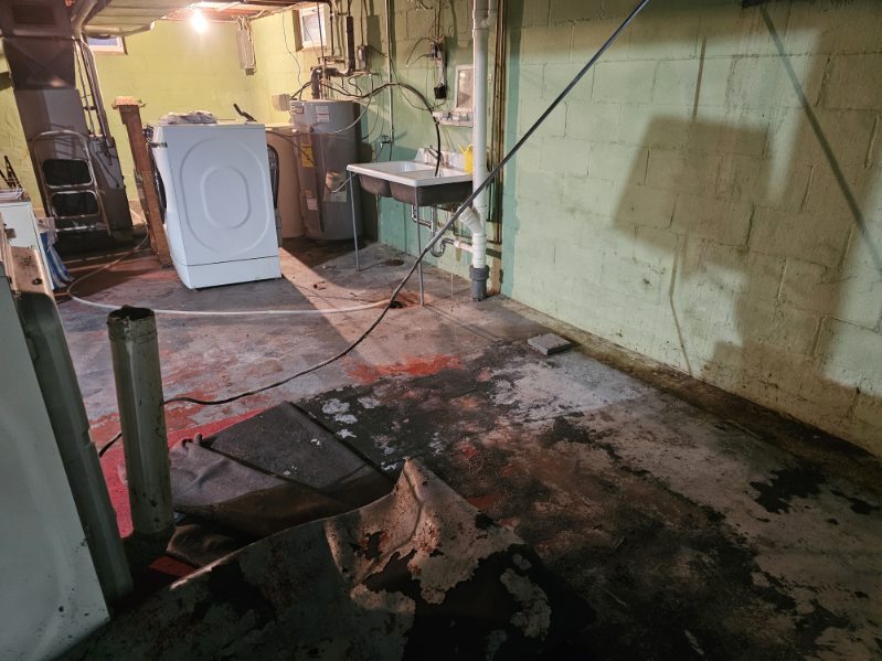 Bettendorf basement during the waterproofing and foundation wall stabilization project