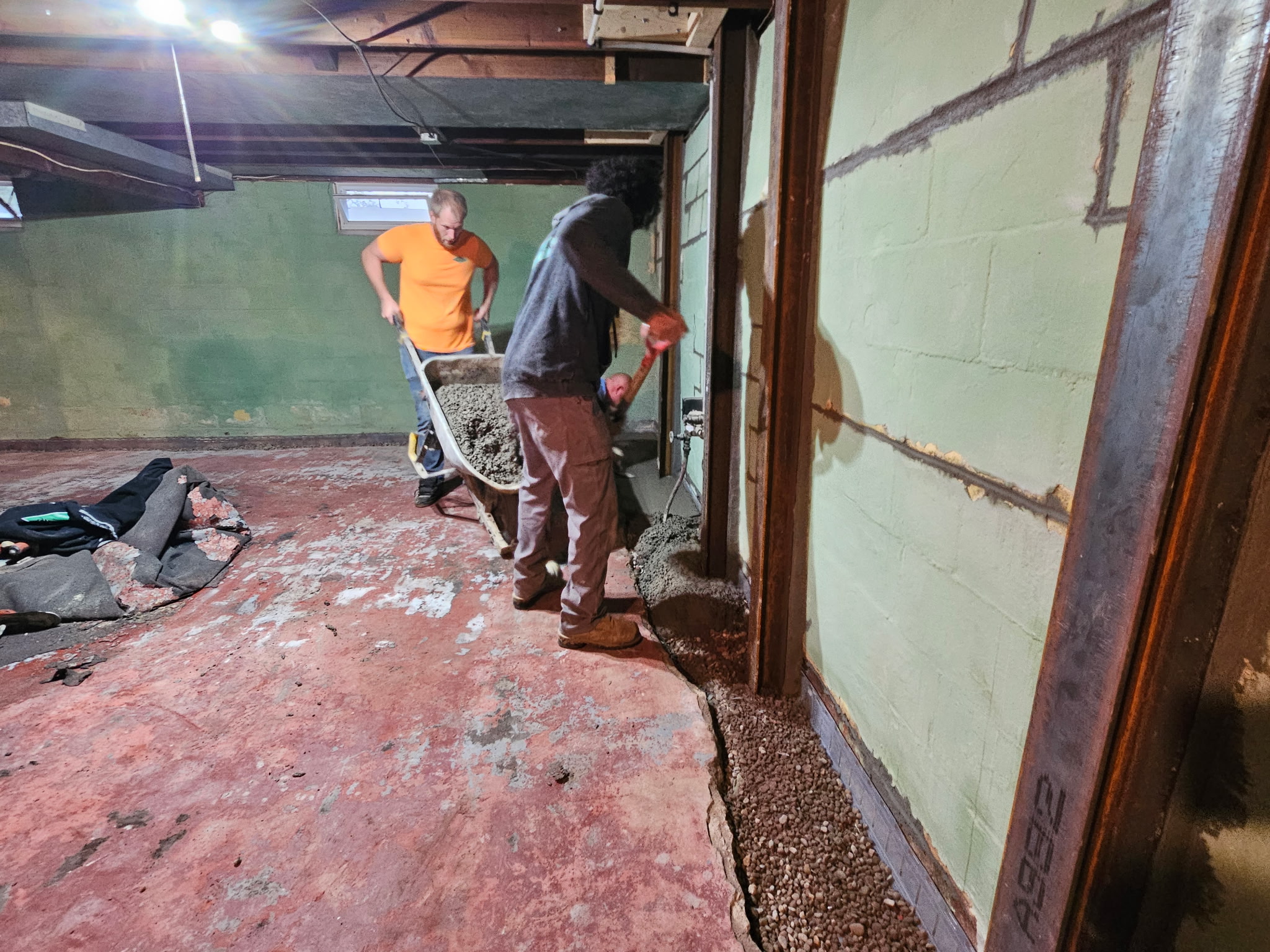Bettendorf basement during the waterproofing and foundation wall stabilization project