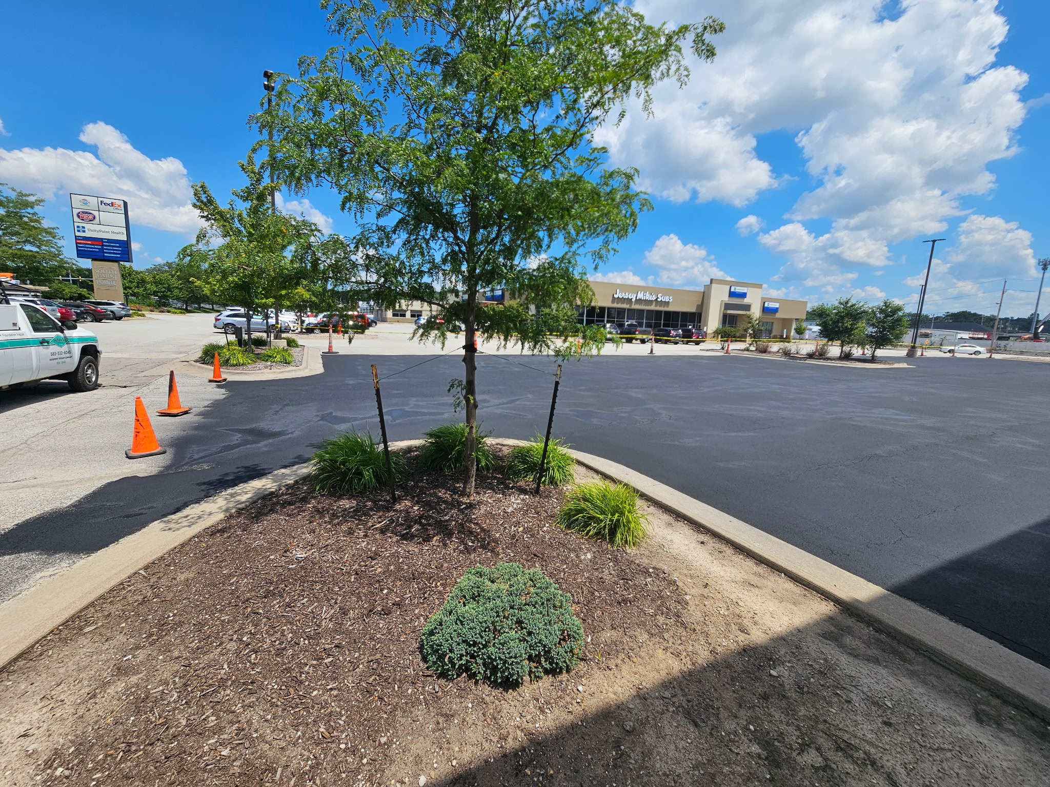 Commercial parking lot off Jersey Ridge Road in Davenport during the phased sealcoating project