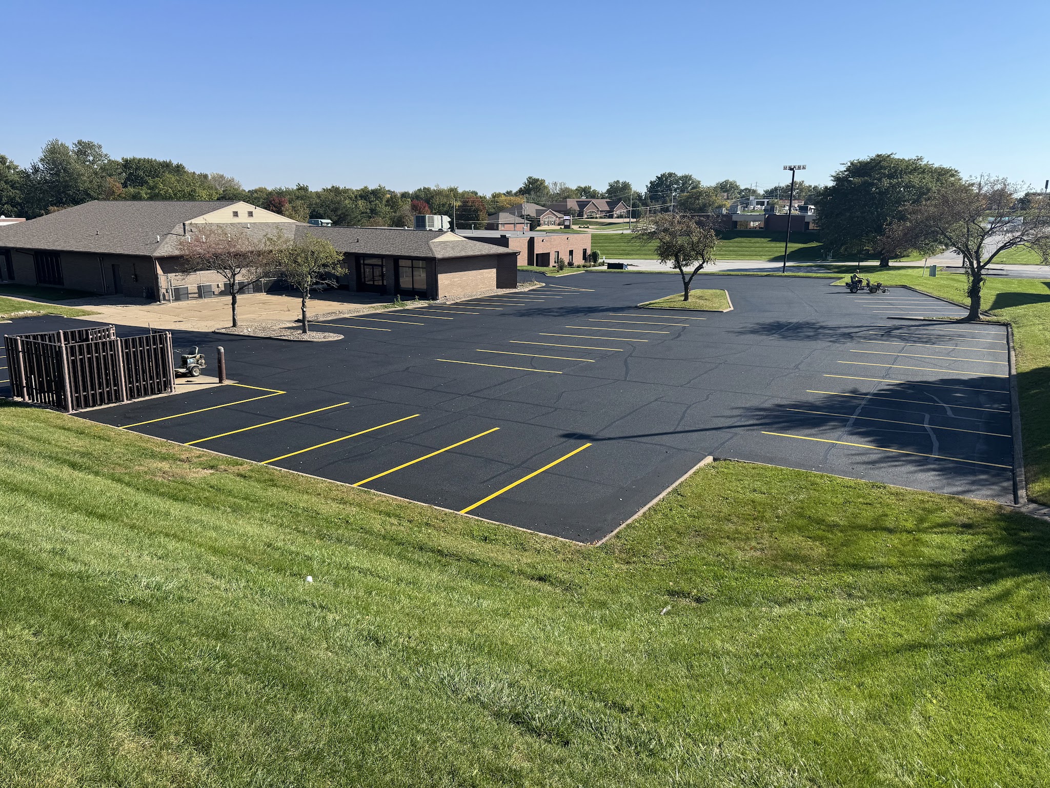 Parking lot at Keller Williams in Bettendorf during the crack filling and sealcoating project